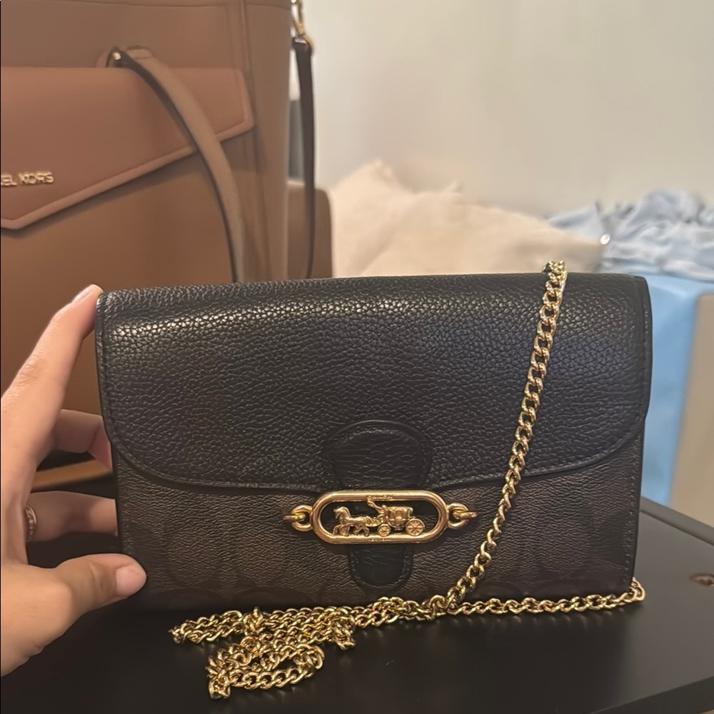 Coach Black Leather Clutch with Gold Accents